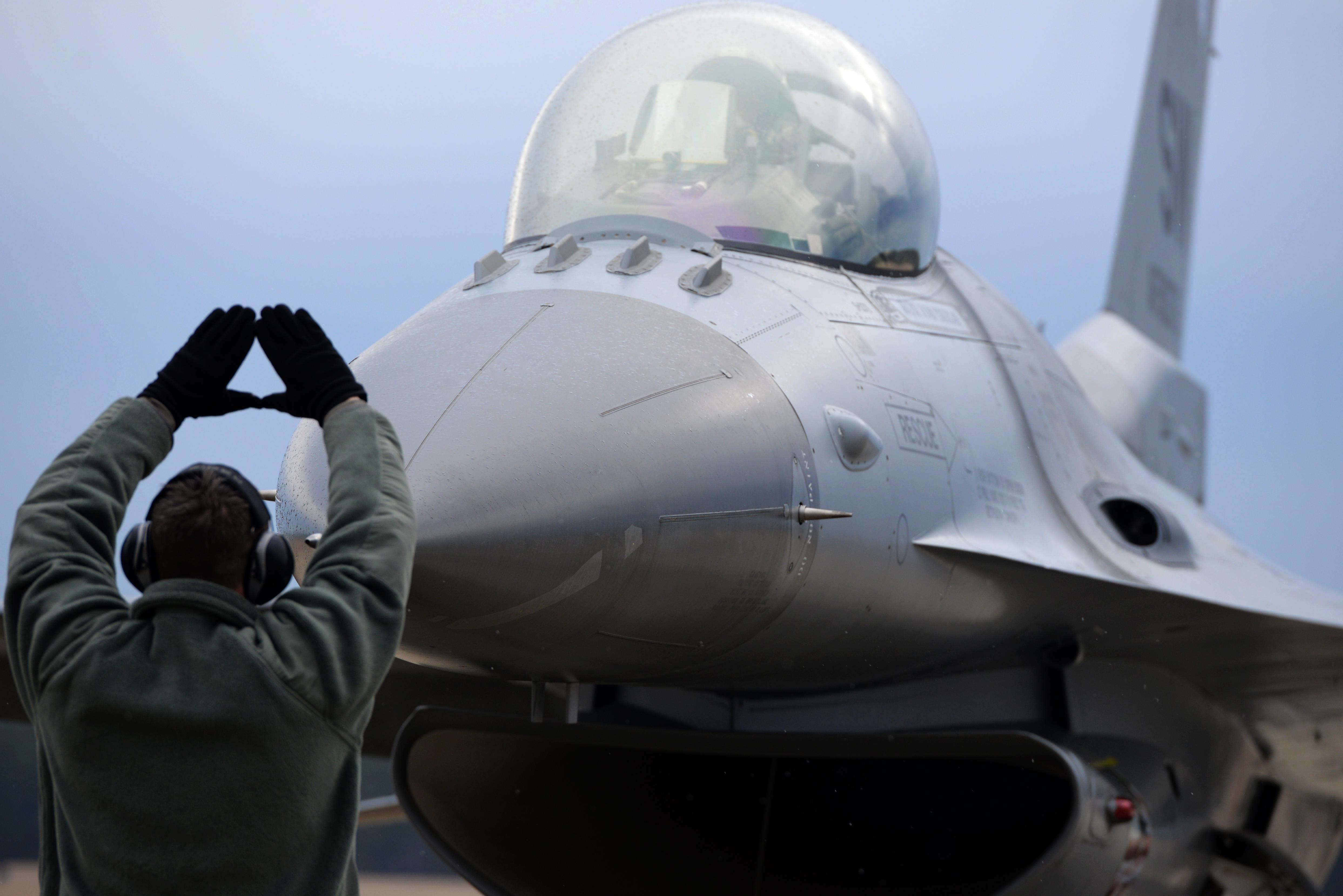 Free download high resolution image - free image free photo free stock image public domain picture -An Airman marshals an F-16 Fighting Falcon