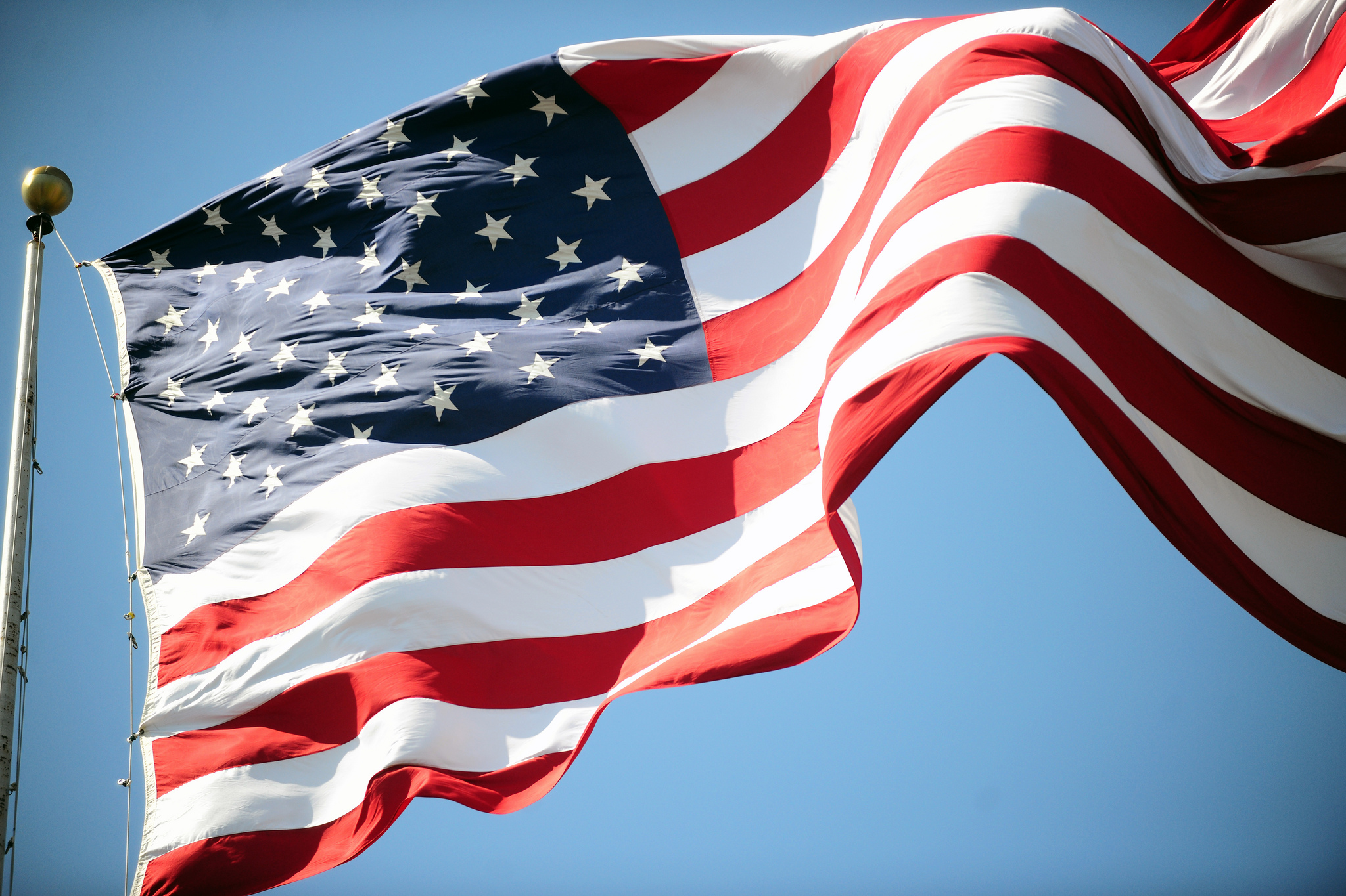 Free download high resolution image - free image free photo free stock image public domain picture -a waving USA flag. Blue sky background